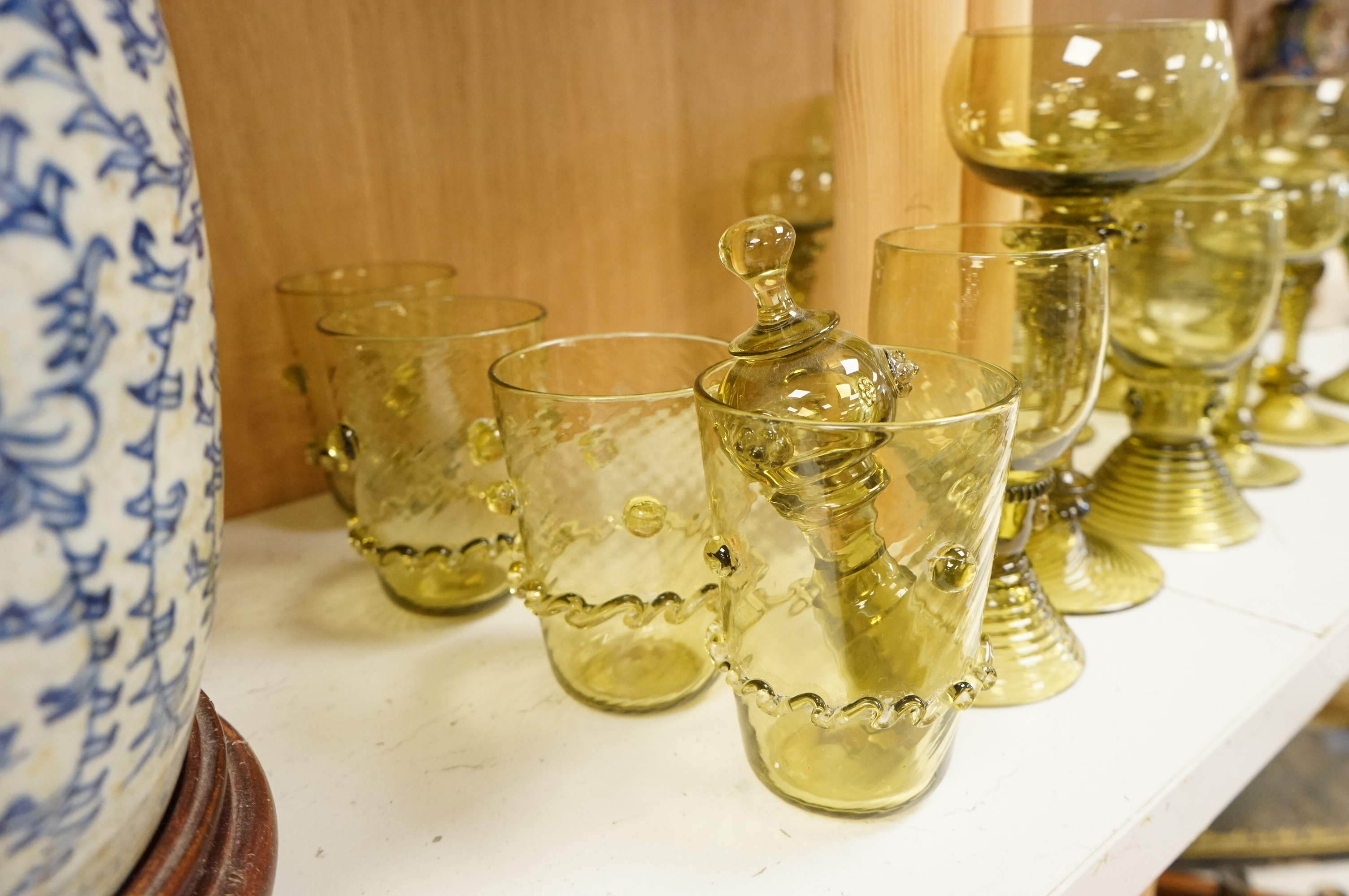 A collection of Continental green glassware to including hock glasses and tumblers, largest 17cm high